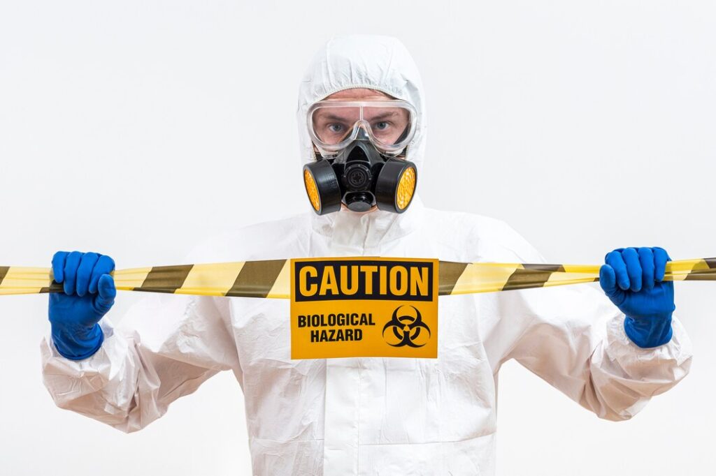 man-hazmat-suit-with-danger-sign_23-2148483231-1024x682 man-hazmat-suit-with-danger-sign_23-2148483231-1024x682